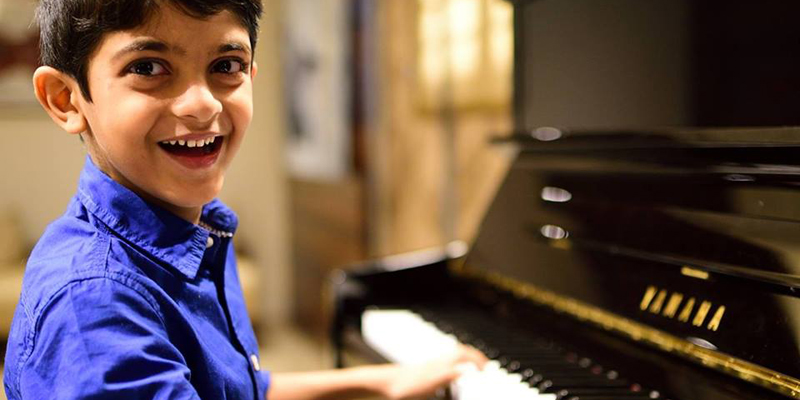 Child enjoying piano